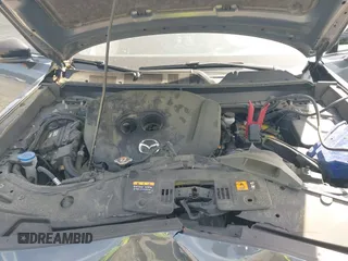 2022 Mazda CX-9 Grand Touring with VIN JM3TCBDY8N0628886, listed as a IAAI auction lot 42074044 with 67,867 mi miles and . Bid and sale history available at DreamBid. Image 10.