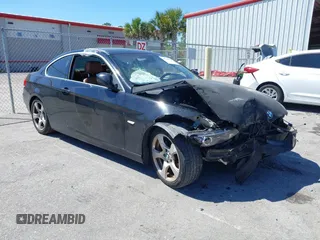 2010 BMW 3 Series 328i with VIN WBAWV1C58AP124385, listed as a IAAI auction lot 41761958 with 197,944 mi miles. Bid and sale history available at carsss.com. Image 1.
