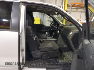 2005 Ford F-150 XLT with VIN 1FTPX14555FA52671, listed as a IAAI auction lot 41733466 with 214,826 mi miles. Bid and sale history available at carsss.com. Image 5.