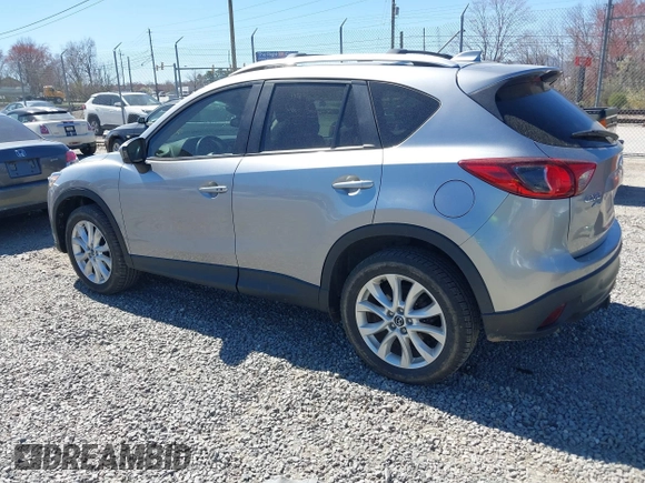 2014 Mazda CX-5 Grand Touring with VIN JM3KE4DY3E0368169, listed as a IAAI auction lot 41857976 with 127,853 mi miles. Bid and sale history available at carsss.com. Image 3.