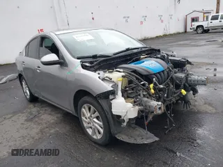 2012 Mazda 3 i Touring with VIN JM1BL1V84C1608638, listed as a IAAI auction lot 41533492 with 132,923 mi miles. Bid and sale history available at carsss.com. Image 1.