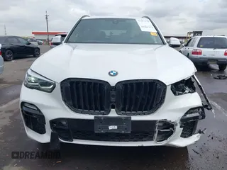 2020 BMW X5 sDrive40i with VIN 5UXCR4C04L9D41635, listed as a IAAI auction lot 42201174 with 64,989 mi miles and . Bid and sale history available at DreamBid. Image 12.