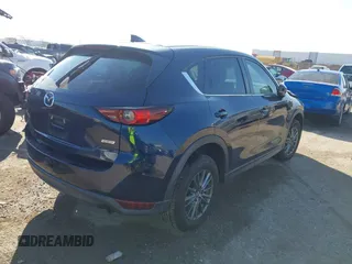 2017 Mazda CX-5 Touring with VIN JM3KFACL1H0192549, listed as a IAAI auction lot 41667781 with 89,030 mi miles. Bid and sale history available at carsss.com. Image 4.