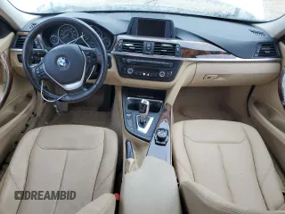 2014 BMW 3 Series 328i with VIN WBA3A5C59EP601899, listed as a Copart auction lot 61430675 with 205,396 mi miles and Salvage title. Bid and sale history available at DreamBid. Image 8.