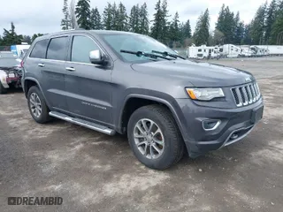 2014 Jeep Grand Cherokee Overland with VIN 1C4RJFCM7EC427204, listed as a IAAI auction lot 41934698 with 147,131 mi miles. Bid and sale history available at carsss.com. Image 1.