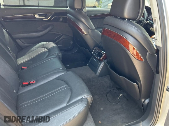 2013 Audi A8 3.0L with VIN WAURGAFD6DN010072, listed as a Copart auction lot 57999295 with 116,555 mi miles and Salvage title. Bid and sale history available at DreamBid. Image 6.