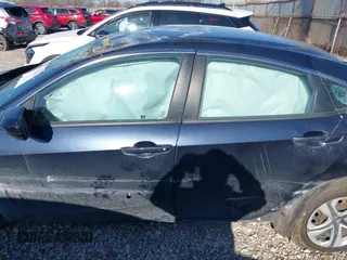 2018 Honda Civic Sedan LX with VIN 19XFC2F58JE016553, listed as a IAAI auction lot 41889434 with 92,045 mi miles. Bid and sale history available at carsss.com. Image 14.