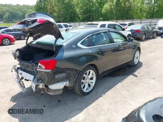 2014 Chevrolet Impala LT with VIN 2G1125S36E9156519, listed as a IAAI auction lot 42145424 with 97,755 mi miles and . Bid and sale history available at DreamBid. Image 4.