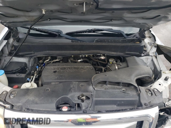 2011 Honda Pilot EX-L with VIN 5FNYF3H71BB033923, listed as a Copart auction lot 56649305 with 132,304 mi miles and Salvage title. Bid and sale history available at DreamBid. Image 12.