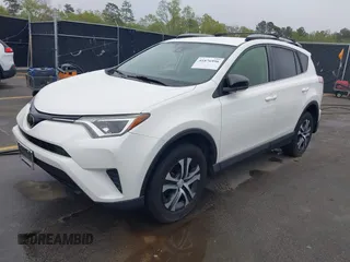 2017 Toyota RAV4 LE with VIN JTMZFREV9HJ704296, listed as a IAAI auction lot 41876996 with 85,605 mi miles and . Bid and sale history available at DreamBid. Image 17.