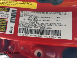 2018 Toyota Tacoma SR5 z VIN 3TMAZ5CN2JM076140, wystawiony jako IAAI lot #41913486 z przebiegiem 142 212 mil mil oraz . Historia ofert i sprzedaży dostępna na DreamBid. Obrazek 19.