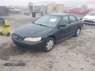 2001 Honda Accord LX z VIN 1HGCG56461A033694, wystawiony jako IAAI lot #41804320 z przebiegiem 250 000 mil mil oraz . Historia ofert i sprzedaży dostępna na DreamBid. Obrazek 17.
