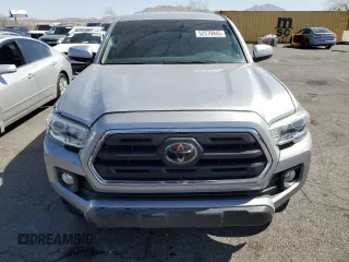 2018 Toyota Tacoma SR5 z VIN 3TMAZ5CN8JM077857, wystawiony jako Copart lot #52570945 z przebiegiem 50 182 mil mil oraz Szkoda całkowita • Salvage title. Historia ofert i sprzedaży dostępna na DreamBid. Obrazek 5.