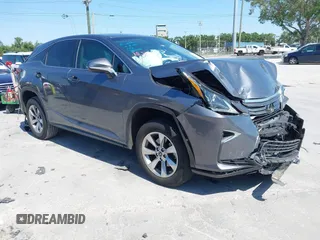 2019 Lexus RX with VIN 2T2ZZMCA0KC132043, listed as a IAAI auction lot 42001021 with 23,663 mi miles. Bid and sale history available at carsss.com. Image 1.