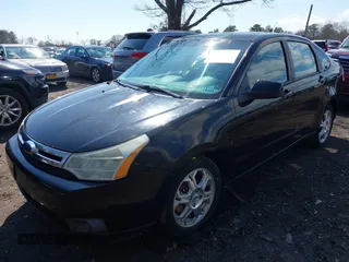 2009 Ford Focus SES with VIN 1FAHP36N49W207901, listed as a IAAI auction lot 41875523 with 95,089 mi miles. Bid and sale history available at carsss.com. Image 2.