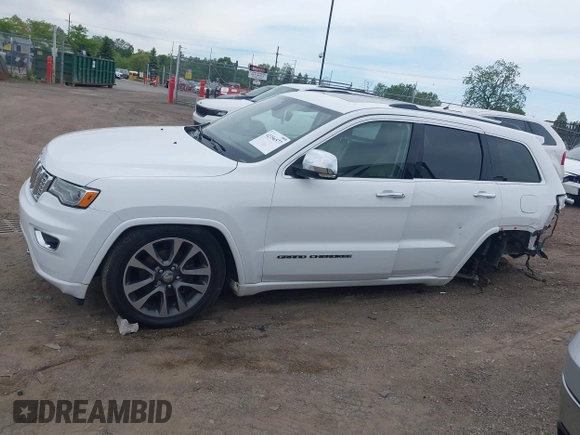 2017 Jeep Grand Cherokee Overland with VIN 1C4RJFCG6HC941771, listed as a IAAI auction lot 42356577 with 192,318 mi miles and . Bid and sale history available at DreamBid. Image 14.