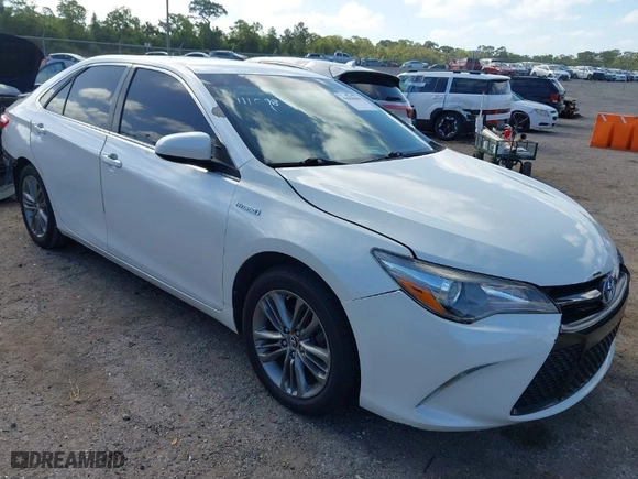 2015 Toyota Camry Hybrid LE with VIN 4T1BD1FK7FU142175, listed as a IAAI auction lot 41958486 with 120,013 mi miles. Bid and sale history available at carsss.com. Image 1.