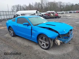 2013 Ford Mustang GT with VIN 1ZVBP8CF4D5268218, listed as a IAAI auction lot 41555868 with 219,385 mi miles. Bid and sale history available at carsss.com. Image 1.