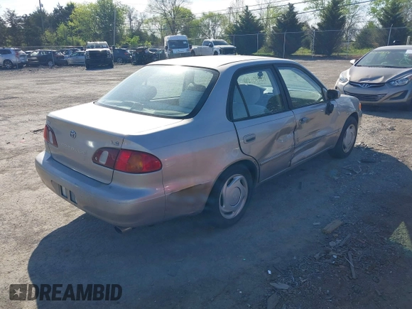 1998 Toyota Corolla VE z VIN 2T1BR18E9WC045442, wystawiony jako IAAI lot #42104201 z przebiegiem 243 256 mil mil oraz . Historia ofert i sprzedaży dostępna na DreamBid. Obrazek 4.