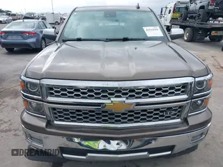 2015 Chevrolet Silverado 1500 LTZ with VIN 3GCPCSEC6FG408754, listed as a IAAI auction lot 41514369 with 140,928 mi miles and . Bid and sale history available at DreamBid. Image 12.