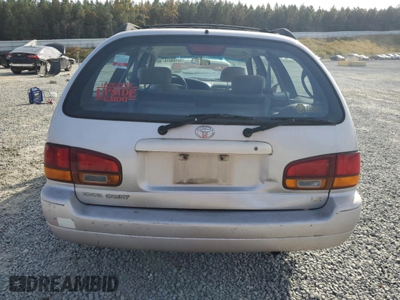 1996 Toyota Camry z VIN 4T1EG12K8TU779386, wystawiony jako Copart lot #79189014 z przebiegiem 142 891 mil mil oraz Czysty tytuł • Clean title. Historia ofert i sprzedaży dostępna na DreamBid. Obrazek 6.