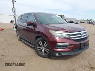 2016 Honda Pilot EX-L with VIN 5FNYF5H57GB028307, listed as a IAAI auction lot 41925711 with 125,118 mi miles and . Bid and sale history available at carsss.com. Image 1.