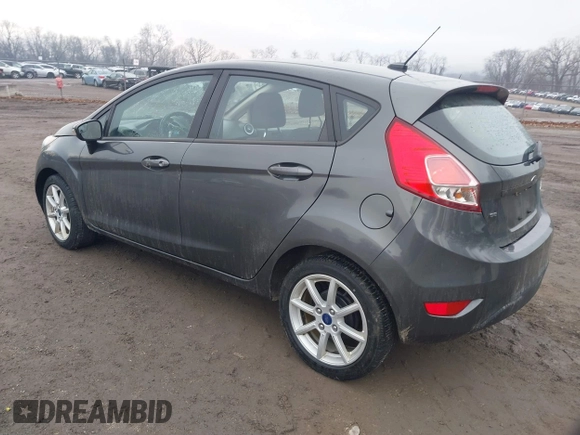 2018 Ford Fiesta SE with VIN 3FADP4EJ9JM126299, listed as a IAAI auction lot 41660973 with 74,730 mi miles. Bid and sale history available at carsss.com. Image 3.