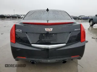 2018 Cadillac ATS RWD z VIN 1G6AA5RX4J0184510, wystawiony jako Copart lot #42934545 z przebiegiem 104 677 mil mil oraz Szkoda całkowita • Salvage title. Historia ofert i sprzedaży dostępna na DreamBid. Obrazek 6.