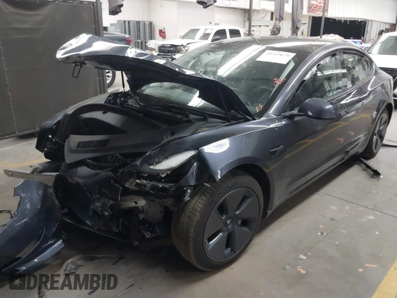 2023 Tesla Model 3 with VIN 5YJ3E1EAXPF669538, listed as a IAAI auction lot 40329679 with 16,612 mi miles and . Bid and sale history available at DreamBid. Image 2.