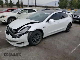 2019 Tesla Model 3 Mid Range with VIN 5YJ3E1EA9KF401525, listed as a Copart auction lot 47808875 with 41,606 mi miles and Salvage Title. Bid and sale history available at carsss.com. Image 1.