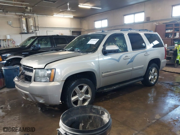 2009 Chevrolet Tahoe LT w/1LT with VIN 1GNFK23069R179124, listed as a IAAI auction lot 41578460 with 143,705 mi miles. Bid and sale history available at carsss.com. Image 17.
