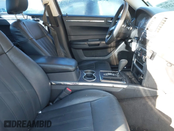 2009 Chrysler 300 LX with VIN 2C3KA43D69H565894, listed as a IAAI auction lot 41283079 with 233,098 mi miles. Bid and sale history available at carsss.com. Image 5.