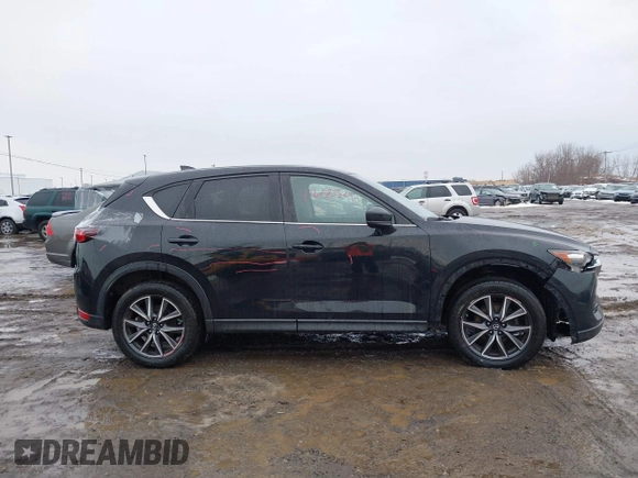 2018 Mazda CX-5 Touring with VIN JM3KFBCMXJ0450040, listed as a IAAI auction lot 41650824 with 83,133 mi miles. Bid and sale history available at carsss.com. Image 13.