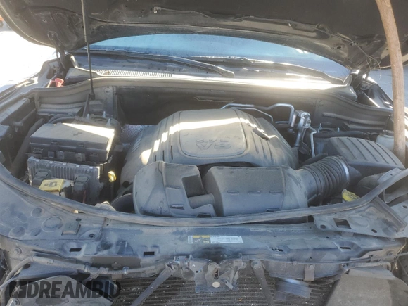 2014 Dodge Durango R/T with VIN 1C4SDJCT9EC596160, listed as a Copart auction lot 58034505 with 140,674 mi miles and Salvage title. Bid and sale history available at DreamBid. Image 12.