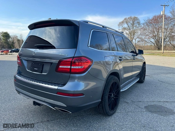 2018 Mercedes-Benz GLS with VIN 4JGDF6EE2JB005743, listed as a Copart auction lot 54836755 with 148,583 mi miles and Clean Title. Bid and sale history available at carsss.com. Image 4.