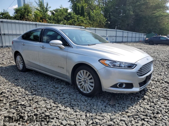 2013 Ford Fusion SE Hybrid with VIN 3FA6P0LU9DR217546, listed as a Copart auction lot 66597775 with Not provided miles and Clean title. Bid and sale history available at DreamBid. Image 4.