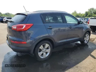 2013 Kia Sportage LX с VIN KNDPBCA25D7508830, выставлен на аукционе Copart как лот 60851165 с пробегом 83 833 миль миль и Списание • Salvage title. История ставок и продаж доступна на DreamBid. Изображение 3.