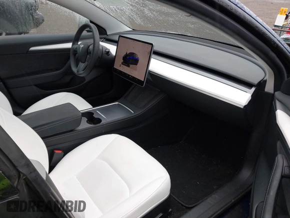 2023 Tesla Model 3 Long Range with VIN 5YJ3E1EB5PF704463, listed as a IAAI auction lot 41916627 with 14,305 mi miles and . Bid and sale history available at DreamBid. Image 5.