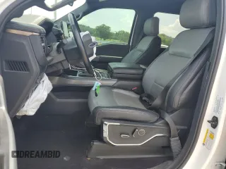 2022 Ford F-150 Lightning Pro with VIN 1FTVW1EL3NWG16146, listed as a Copart auction lot 65322785 with 68,928 mi miles and Salvage title. Bid and sale history available at DreamBid. Image 7.