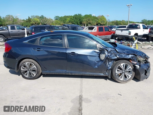 2016 Honda Civic Sedan EX-L with VIN 19XFC1F71GE041024, listed as a IAAI auction lot 41943073 with 59,833 mi miles. Bid and sale history available at carsss.com. Image 13.