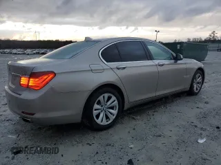 2012 BMW 7 Series 740i with VIN WBAKA4C56CDS99041, listed as a Copart auction lot 41436735 with 170,059 mi miles and Clean title. Bid and sale history available at DreamBid. Image 3.