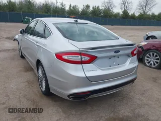 2013 Ford Fusion Titanium with VIN 3FA6P0K93DR260275, listed as a IAAI auction lot 42002127 with 126,751 mi miles. Bid and sale history available at carsss.com. Image 3.