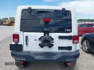 2015 Jeep Wrangler Unlimited Rubicon z VIN 1C4BJWFG1FL544883, wystawiony jako IAAI lot #42838891 z przebiegiem 87 801 mil mil oraz . Historia ofert i sprzedaży dostępna na DreamBid. Obrazek 16.