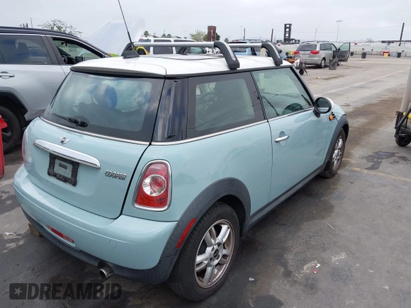 2013 MINI Hardtop with VIN WMWSU3C50DT546031, listed as a IAAI auction lot 42542290 with 119,711 mi miles and . Bid and sale history available at DreamBid. Image 4.