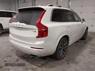 2016 Volvo XC90 T6 Momentum with VIN YV4A22PK6G1088555, listed as a IAAI auction lot 41526090 with 99,877 mi miles. Bid and sale history available at carsss.com. Image 4.