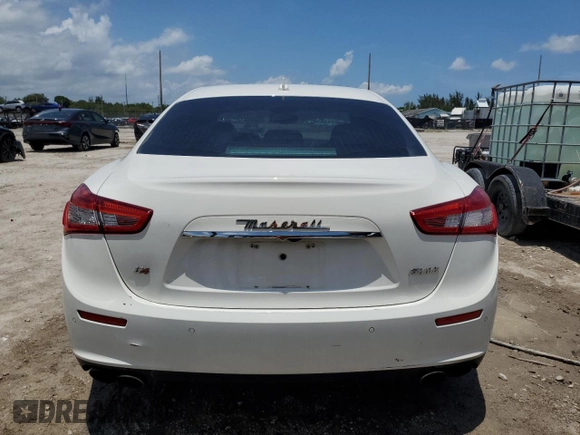 2014 Maserati Ghibli S Q4 z VIN ZAM57RTA1E1126438, wystawiony jako Copart lot #58388215 z przebiegiem 95 167 mil mil oraz Czysty tytuł • Clean title. Historia ofert i sprzedaży dostępna na DreamBid. Obrazek 6.