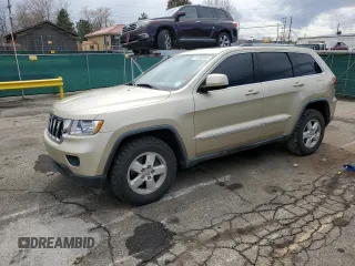 2011 Jeep Grand Cherokee Laredo with VIN 1J4RR4GG3BC641016, listed as a Copart auction lot 51538085 with 62,912 mi miles and Salvage Title. Bid and sale history available at carsss.com. Image 1.