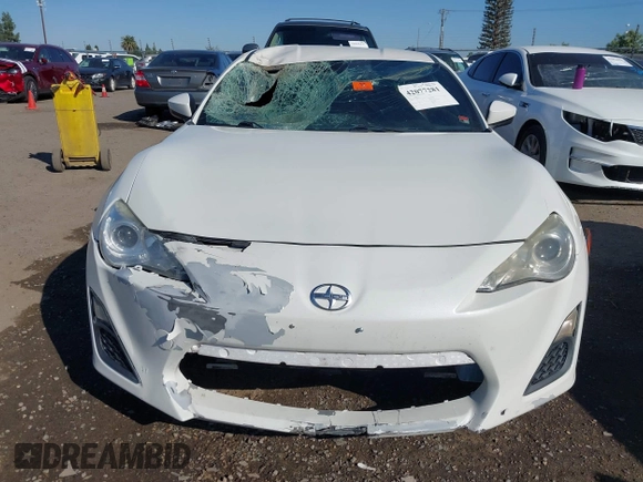 2016 Scion FR-S with VIN JF1ZNAA19G9709205, listed as a IAAI auction lot 42077281 with 68,549 mi miles. Bid and sale history available at carsss.com. Image 13.