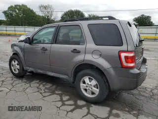 2012 Ford Escape XLT with VIN 1FMCU0D73CKA20143, listed as a Copart auction lot 63111075 with 136,942 mi miles and Salvage title. Bid and sale history available at DreamBid. Image 2.