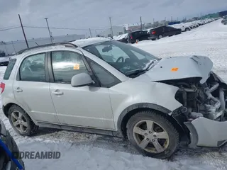 2012 Suzuki SX4 Crossover with VIN JS2YB5A31C6304822, listed as a IAAI auction lot 41366800 with 123,672 mi miles and . Bid and sale history available at DreamBid. Image 13.